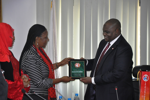 Chairman, Economic and Financial Crimes Commission (EFCC), Ibrahim Lamorde (right) presenting a plaque to the Chairman, Nigeria Maritime Expo (NIMAREX) Planning Committee, Barr. (Mrs) Margaret Onyema-Orakwusi, when NIMAREX visited the EFCC Chairman in Abuja last Tuesday.