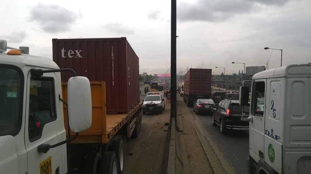 PHOTOS: A fallen container causing heavy traffic at Oshodi