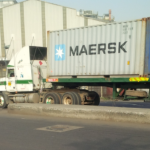 A truck exiting the port after clearance by the releasing officer