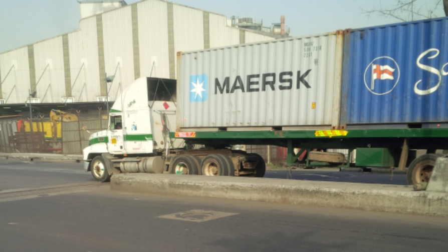 A truck exiting the port after clearance by the releasing officer