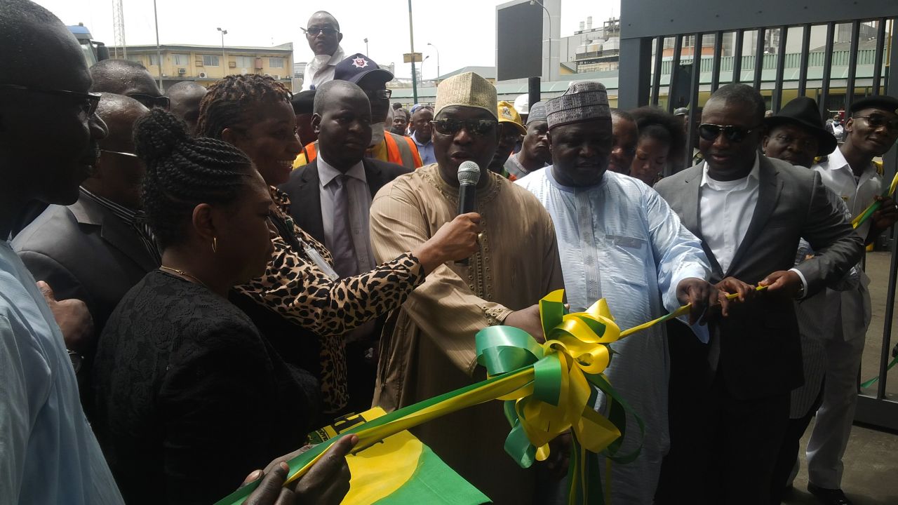 Managing Director, Nigerian Ports Authority, Mallam Habib Abdullahi cutting the tape to flag off implementation of minimum standards for trucks plying the seaports at the Lagos Port Complex, Apapa on Thursday.