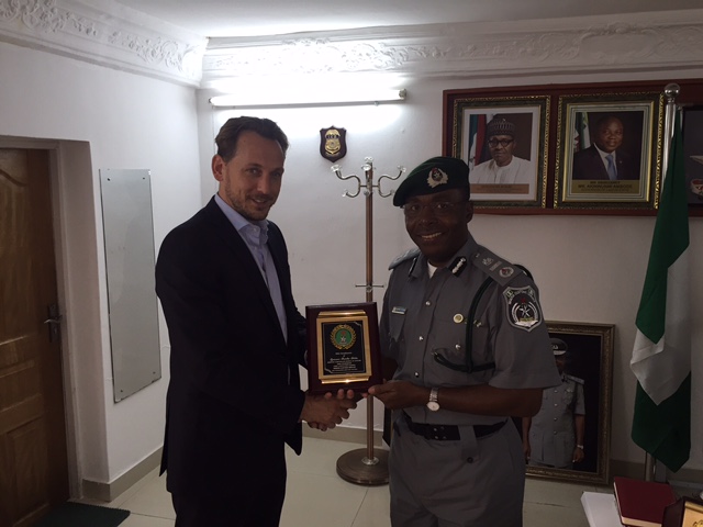 Zonal Coordinator, Nigeria Customs Service Zone A, Assistant Comptroller-General Charles Edike presenting a plaque to the Managing Director, APM Terminals Apapa, Andrew Dawes who visited him in his office at Harvey Road, Yaba, Lagos on Thursday.