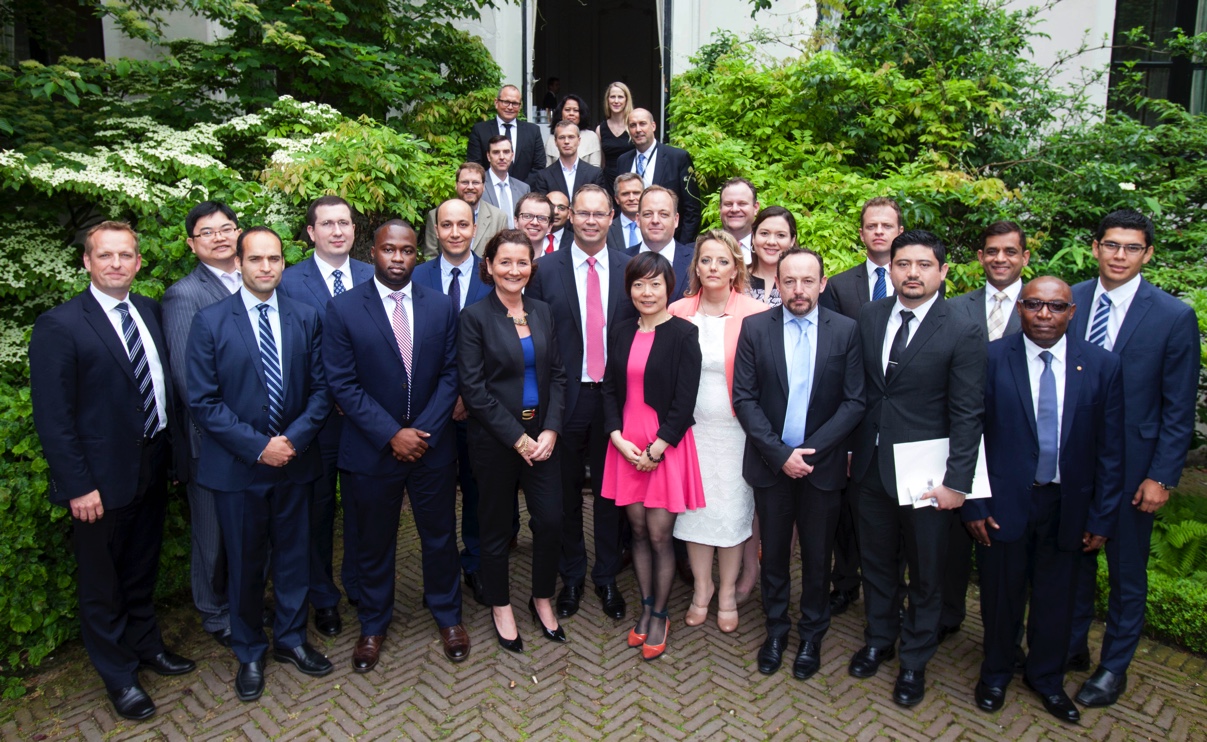 CEO of APM Terminals, Kim Fejfer (middle) with 19 competitively selected managers from across the APM Terminals Global Terminal Network who graduated from the MAGNUM accelerated leadership training program of the company in The Hague last week