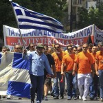 Greek port workers vow to continue strike over privatisation