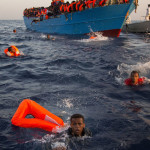 Thousands of African migrants including new-born baby rescued from Mediterranean sea