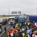 French truck drivers blockade port of Calais to protest migrant crisis  