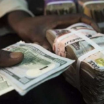 Importers groan as naira slides to N610 per dollar