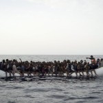 Armed men attack migrant boat, kill four
