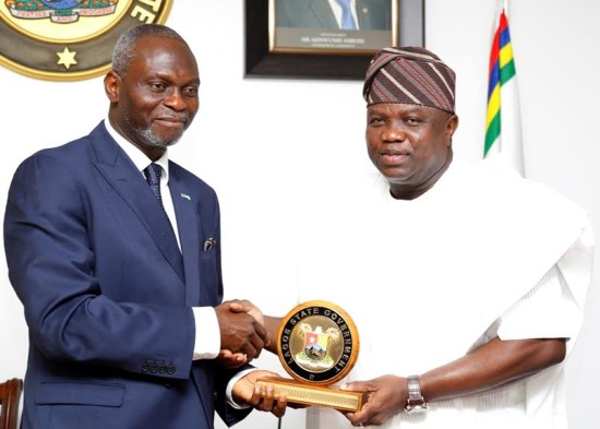 Lagos State Governor, Akinwunmi Ambode (right), presenting a State plaque to President, Nigerian-British Chamber of Commerce, Prince Dapo Adelegan during a courtesy visit to the Governor, at the Lagos House, Ikeja, on Tuesday.