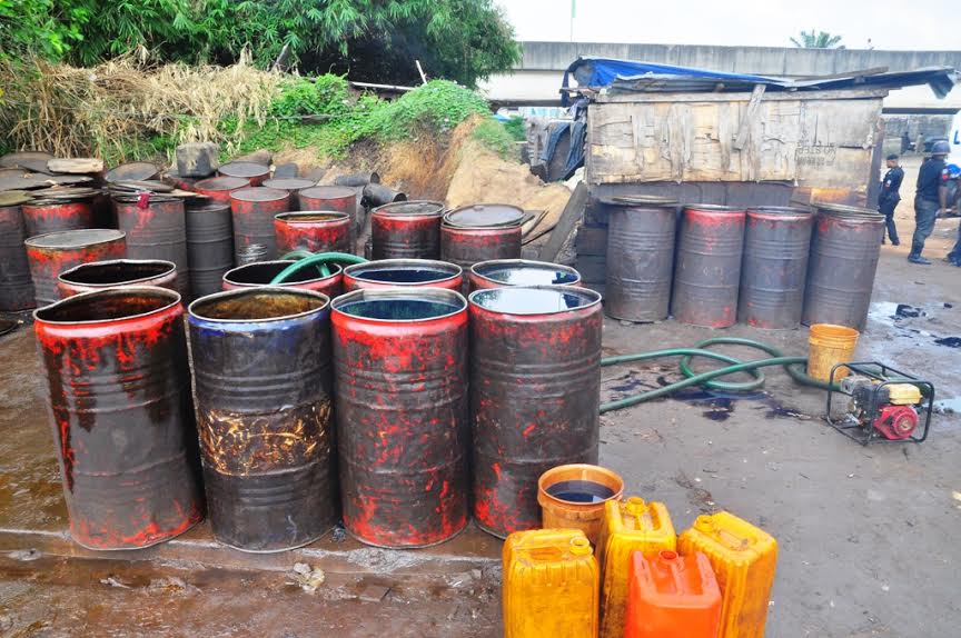 Illegal oil depot uncovered in Lagos, Police arrests 8 suspects