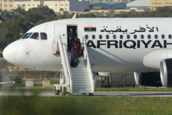 A group of hostages are released from the Libyan plane after it was hijacked and landed in Malta Airport.