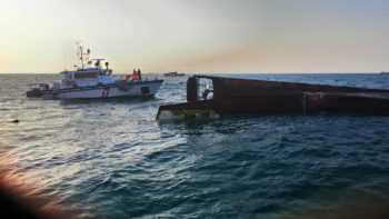 Two dead, four missing as fishing boat collides with bulk carrier 