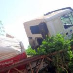 Dangote truck, CRV plunge into river