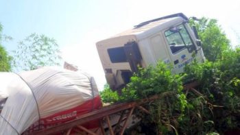 Dangote truck, CRV plunge into river