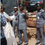 PHOTOS: Bundles of firewood used to hide car smuggled in truck 