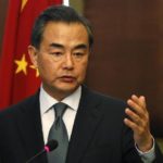 China's Foreign Minister Wang Yi talks during a news conference with Egypt's Foreign Minister Sameh Shoukry in Cairo