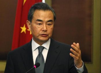 China's Foreign Minister Wang Yi talks during a news conference with Egypt's Foreign Minister Sameh Shoukry in Cairo