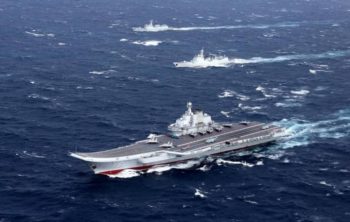 China's Liaoning aircraft carrier with accompanying fleet conducts a drill in an area of South China Sea, in this undated photo taken December, 2016. REUTERS/Stringer