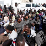 Smugglers kill 22 African migrants on Libya beach