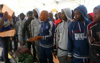 migrants from the Nigeria wait at Tripoli’s Mitiga International Airport