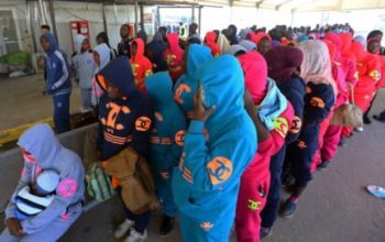 migrants from the Nigeria wait at Tripoli’s Mitiga International Airport