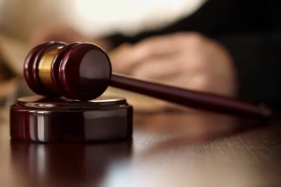 Three men in court for assaulting truck driver
