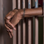 man with handcuff