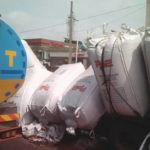 Another truck pours its load due to bad road at Apapa