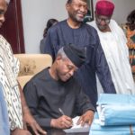 PHOTOS-Osinbajo-signing-2017-Budget-2