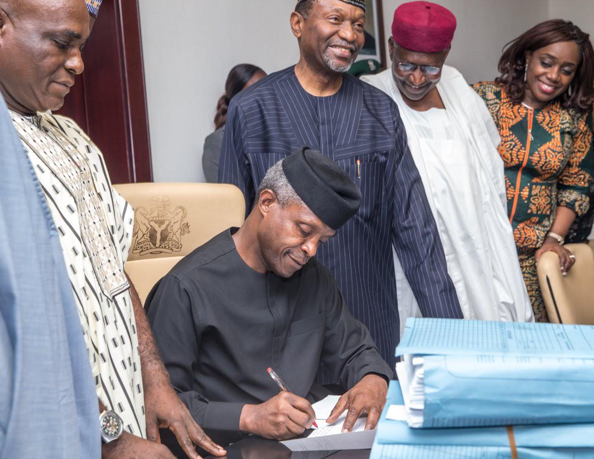 PHOTOS-Osinbajo-signing-2017-Budget-2