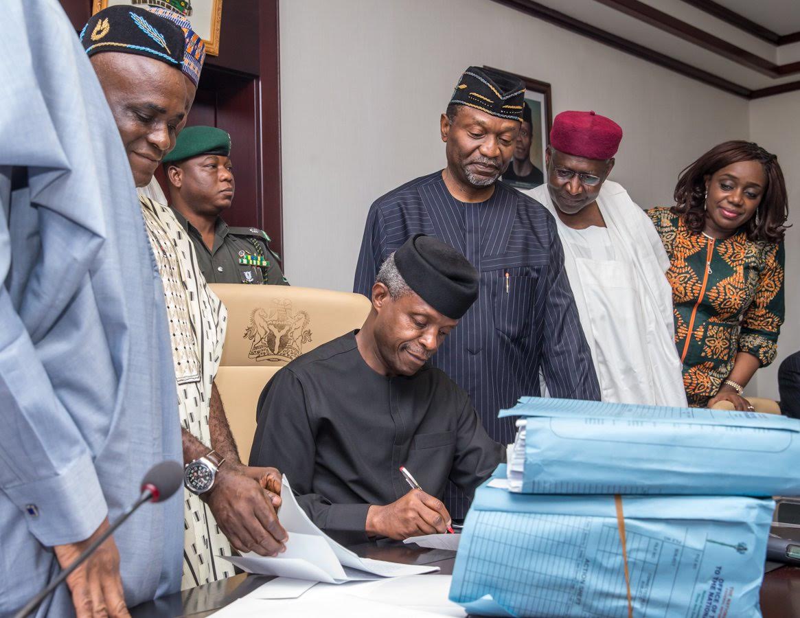 PHOTOS-Osinbajo-signing-2017-Budget