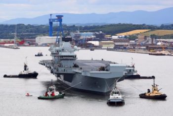 The 65,000-tonne HMS Queen Elizabeth, the Royal Navy’s largest ever warship, puts to sea for the first time, June 26, 2017. Photo: Royal Navy. 