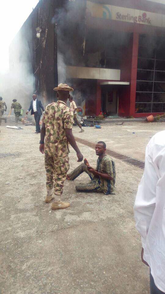 Irate mob burns down Diamond Bank after policeman kills truck driver in Apapa