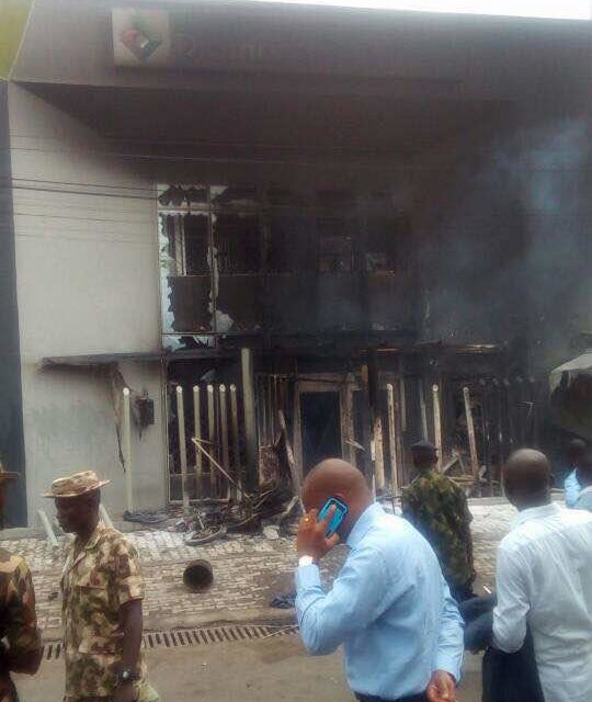 Irate mob burns down Diamond Bank after policeman kills truck driver in Apapa