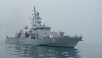 U.S. Navy fires shots at Iranian ship 