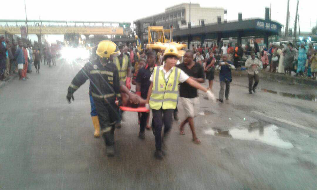 container falls on commercial bus at Ojota 1