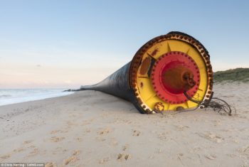 Giant pipes beach after breaking free from tow