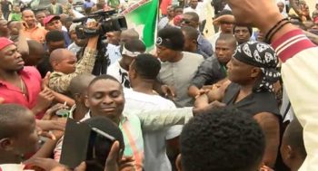 Thugs attack #ResumeOrResign protesters in Abuja -1