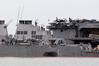 U.S.-divers-find-remains-in-hull-of-damaged-destroyer