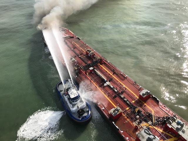 U.S. intensifies cleanup after oil barge explosion1
