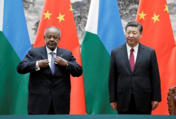 Chinese President Xi Jinping and Djibouti's President Ismail Omar Guelleh attend a signing ceremony at the Great Hall of the People in Beijing