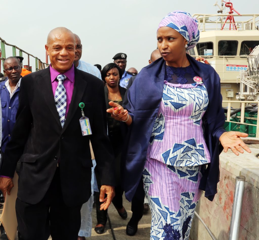 Usman (right), the Port Manager, Tin Can Island Port, Emmanuel Akporherhe, and others at the scene of the fire. 