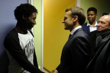 Ahead of UK summit, Macron visits migrants in port of Calais