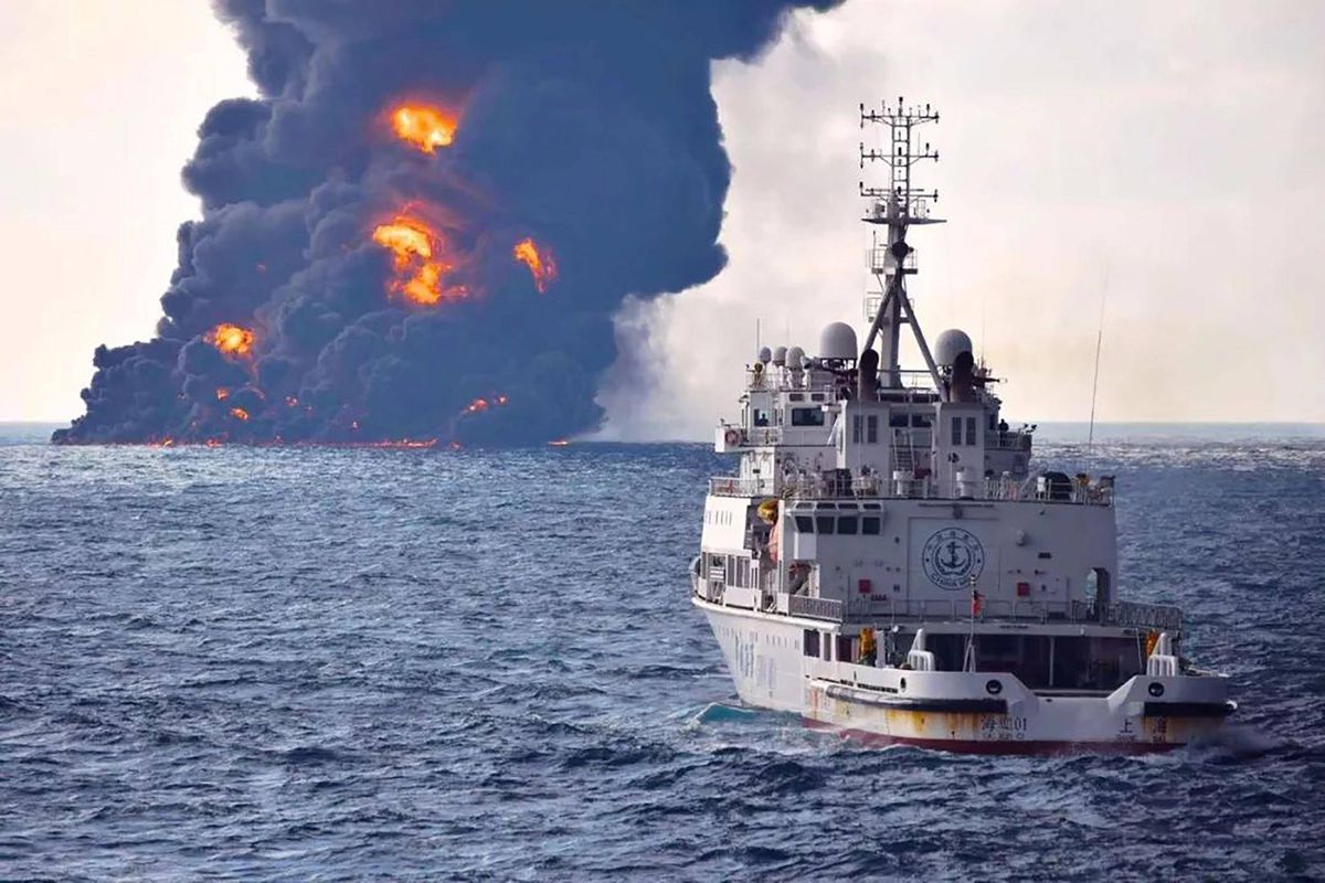 China says sunken Iranian tanker may now be leaking heavy oil