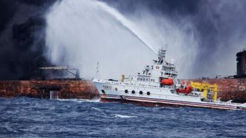 China says sunken Iranian tanker may now be leaking heavy oil