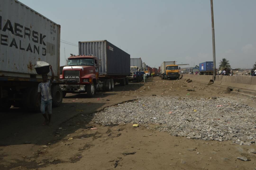 Gravels dumped on the Tin Can port road to ease vehicular movement.