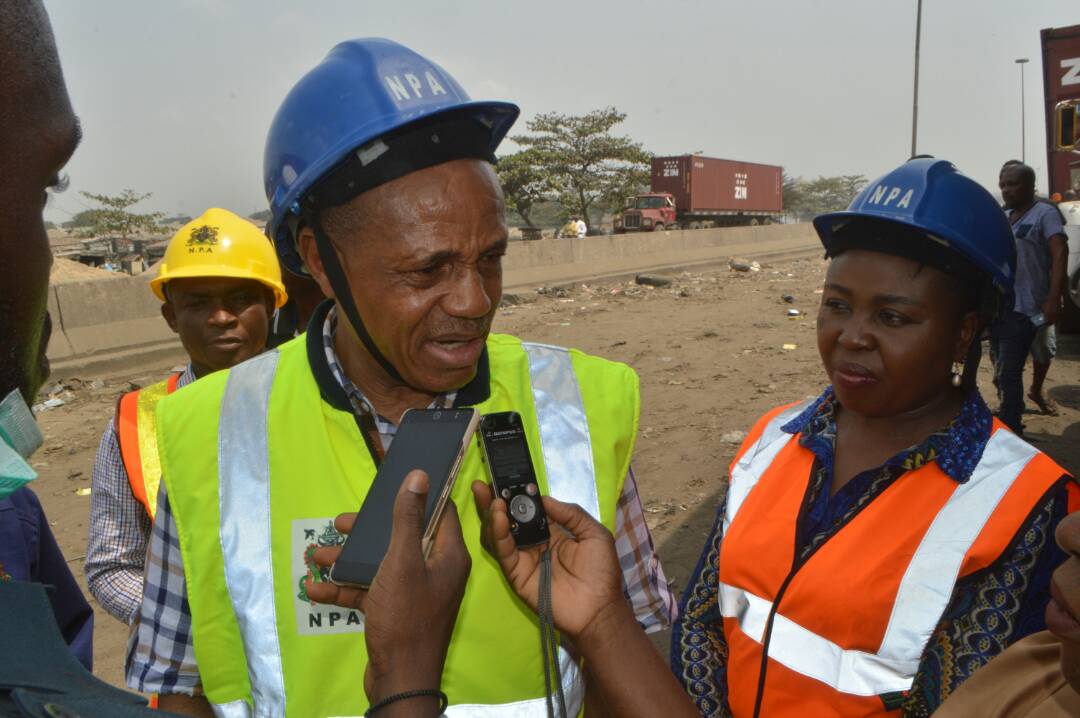 The Port Manager fielding questions from journalists.