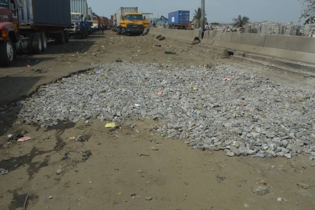 Gravel dumped on the road to provide succour to motorists.
