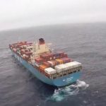 Disabled containership MOL Prestige under tow off British Columbia