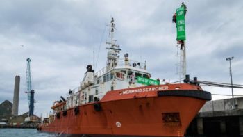 Greenpeace activists board support vessel in New Zealand port